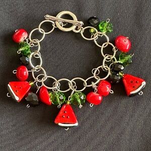 Acrylic & silvertone GUC charm bracelet. Watermelon slice shaped beads w/ toggle